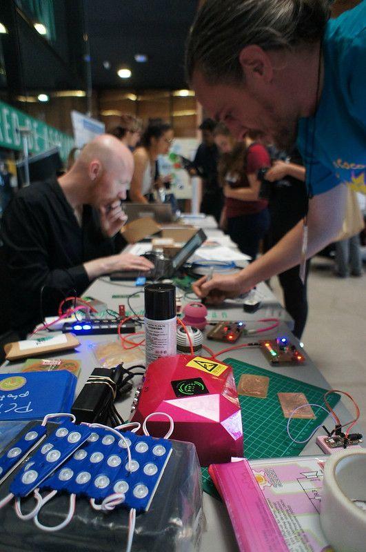 Attendee at the 2017 GOSH Gathering soldering a printed circuit board