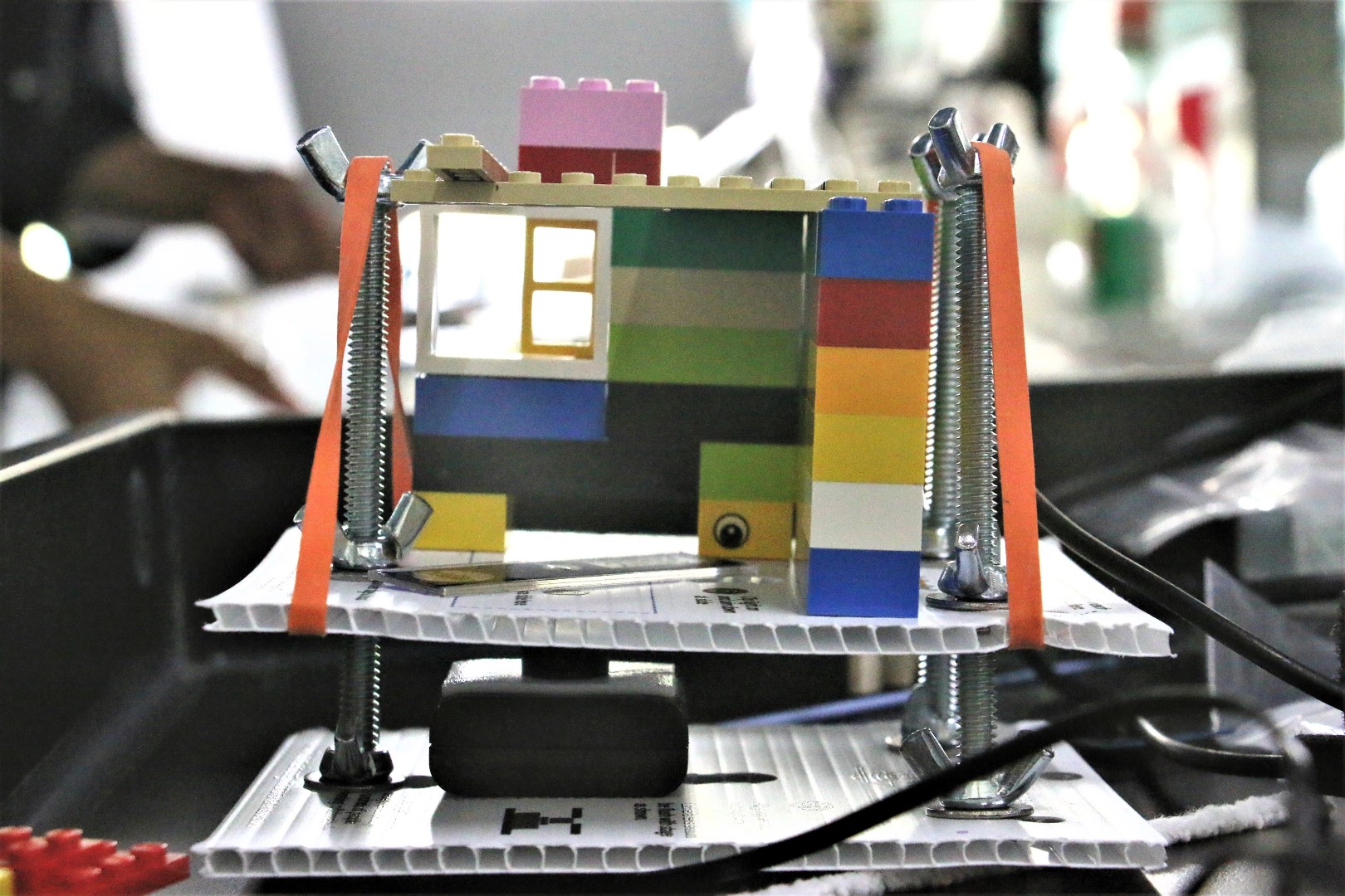 Photo of a lego house built at the previous GOSH Gathering